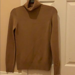 Gently worn brown turtleneck